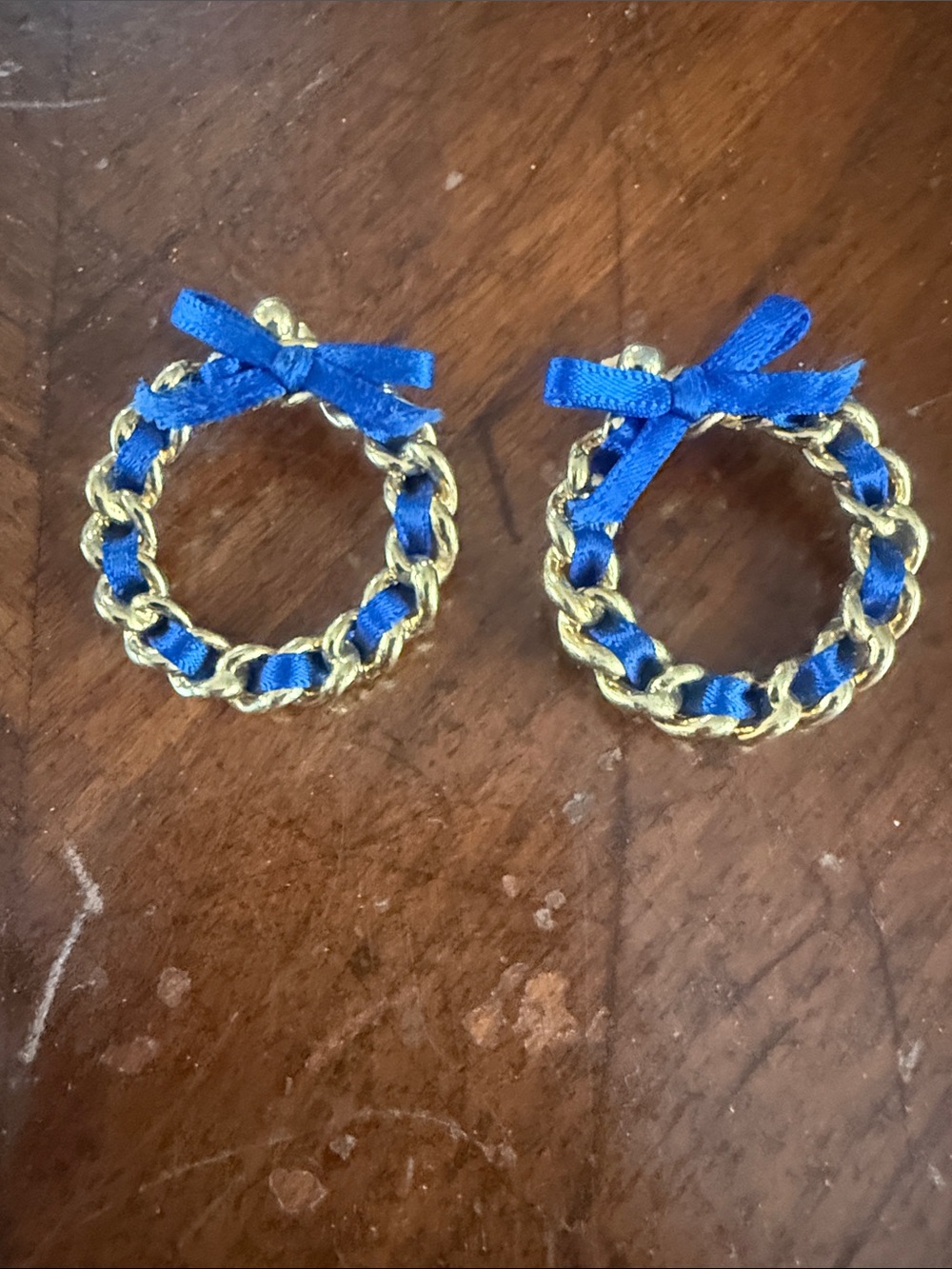 Avon Earrings Gold Tone Wreath Hoop Earrings featuring a Woven Blue Ribbon